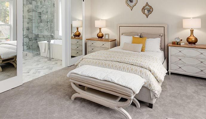 Clean and beautiful carpeted bedroom
