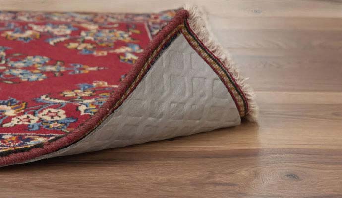 Protective rug pad under oriental rug