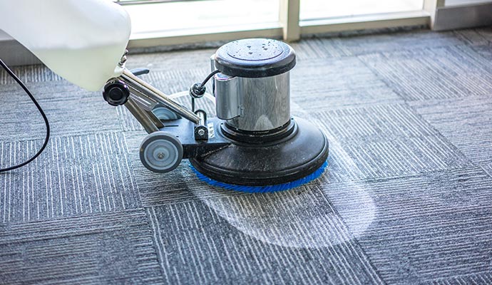 Commercial carpet cleaning with equipment
