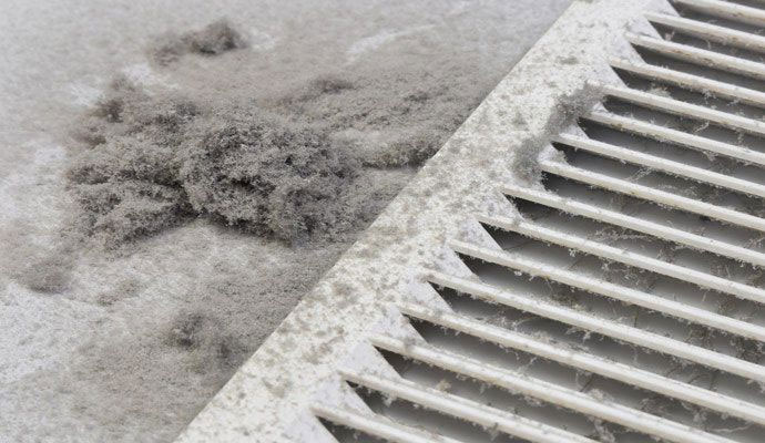 Heavy dust buildup on air vent register