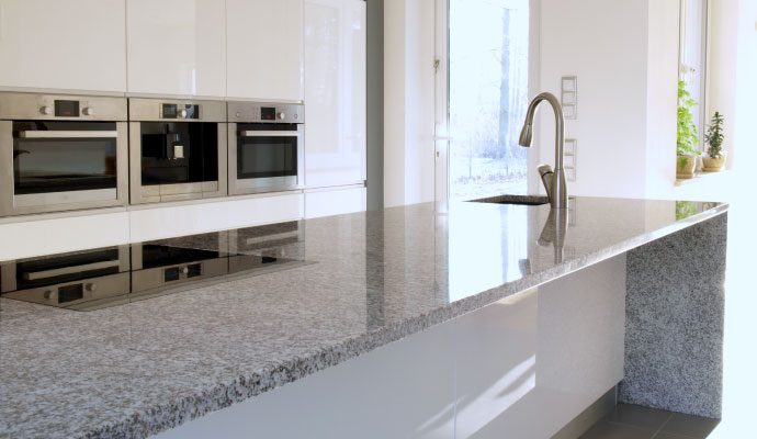 Clean granite and marble countertop in a modern kitchen