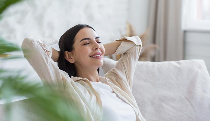A person is relaxing in improved air quality